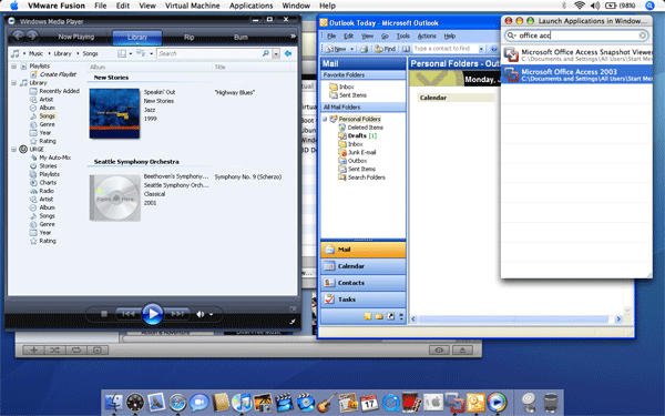 Окна Windows Media Player и Microsoft Outlook в хостовой системе Mac OS, показываемые с помощью Unity