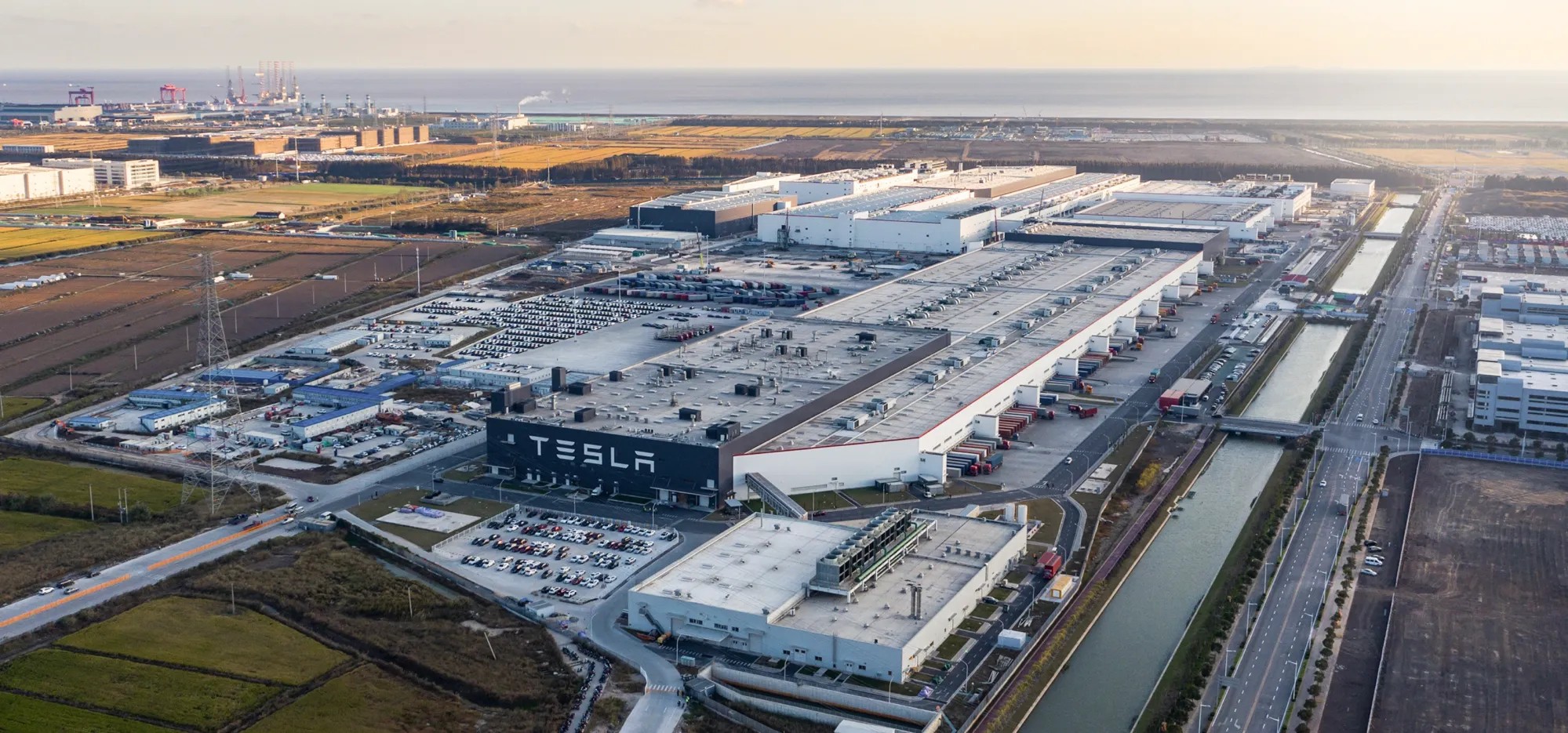 Tesla will create the world’s largest car export center.  The company is building another plant in Shanghai