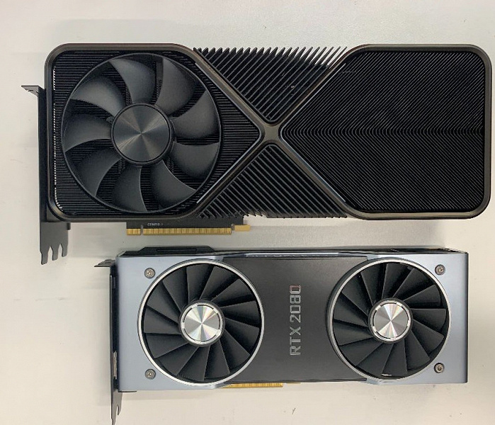 Это GeForce RTX 3090, и она огромна. Рядом с ней RTX 2080 смотрится весьма компактной